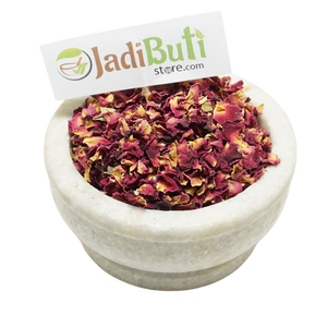 Gulab Patti pink-red dried rose petal pieces in a stone bowl — Jadibuti Store