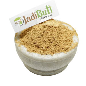 Safed Chandan pale yellow-beige powder in a stone bowl — Jadibuti Store