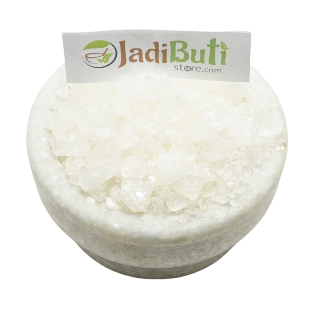 Ajwain Satva white translucent granules in a stone bowl — Jadibuti Store