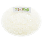 Ajwain Satva white translucent granules on a white plate — Jadibuti Store
