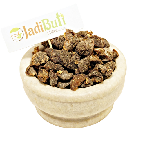 Dried Amla fruit pieces in a stone bowl with Jadibuti Store card