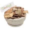 Natural Arjun Chaal dried bark pieces in a stone bowl — Jadibuti Store