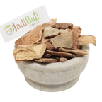 Natural Arjun Chaal dried bark pieces in a stone bowl — Jadibuti Store
