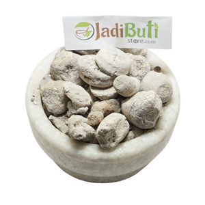 Banslochan trade material in a stone bowl with Jadibuti Store sign