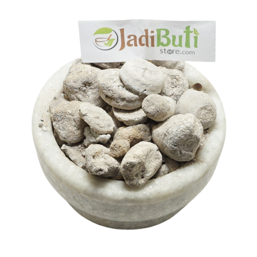 Banslochan trade material in a stone bowl with Jadibuti Store sign