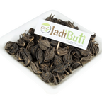 Kaknasa / Baghnakhi / काकनासा — dark horned fruit pods on a square plate