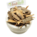 Dalchini irregular tan and brown cinnamon bark pieces in a stone bowl — Jadibuti Store