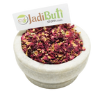 Gulab Patti pink-red dried rose petal pieces in a stone bowl — Jadibuti Store