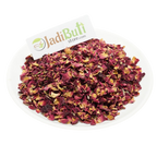 Gulab Patti dried rose petal pieces on a white plate — Jadibuti Store