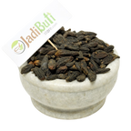 Natural Choti Harad Haritaki dark dried fruits in a stone bowl — Jadibuti Store