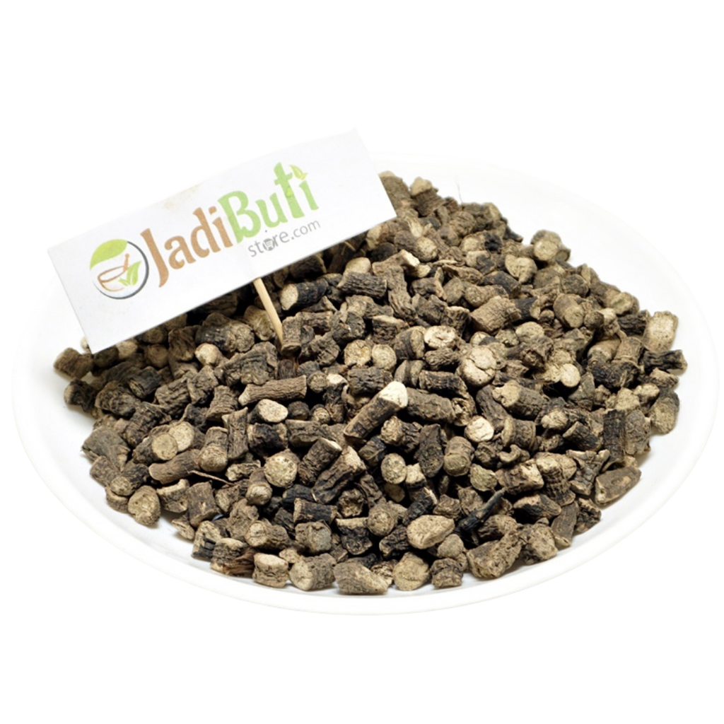 Kali Musli dried cut rhizome pieces on a white plate — Jadibuti Store