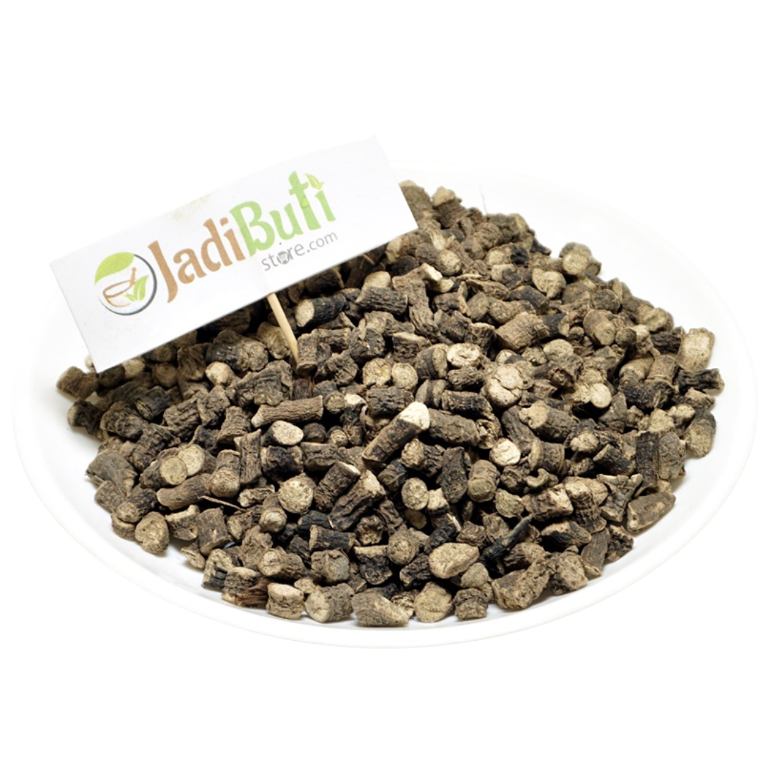 Kali Musli dried cut rhizome pieces on a white plate — Jadibuti Store