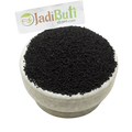Kalonji whole black Nigella seeds in a stone bowl — Jadibuti Store