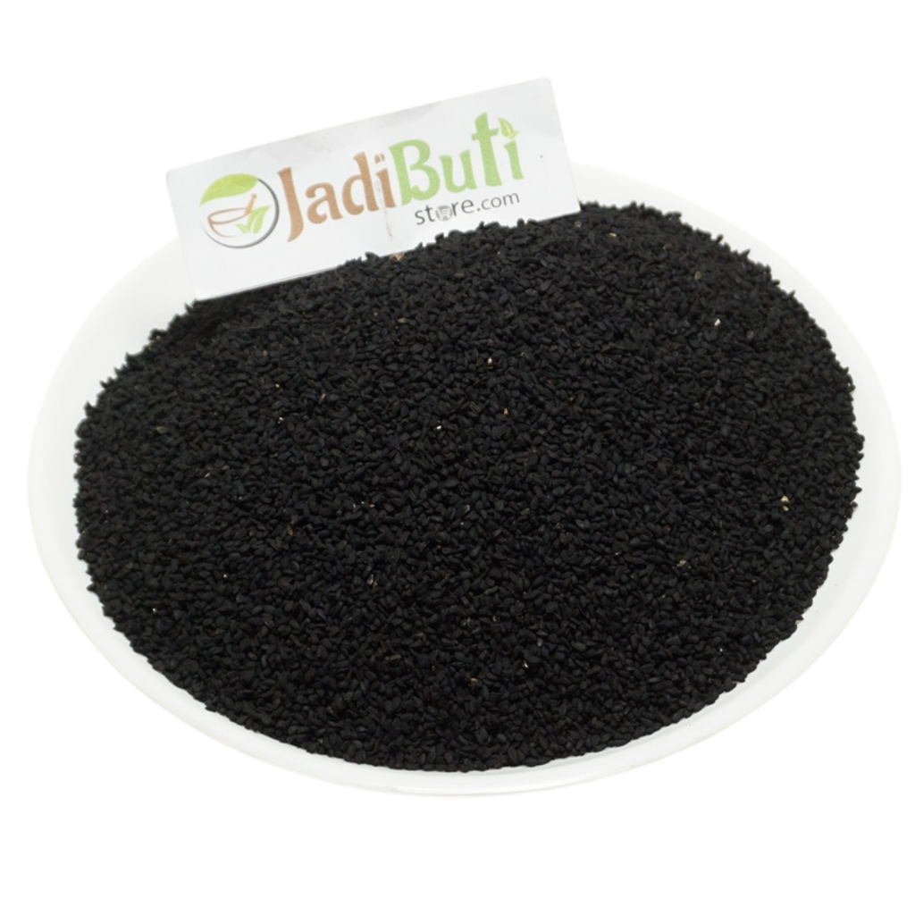 Kalonji whole black Nigella seeds on a white plate — Jadibuti Store