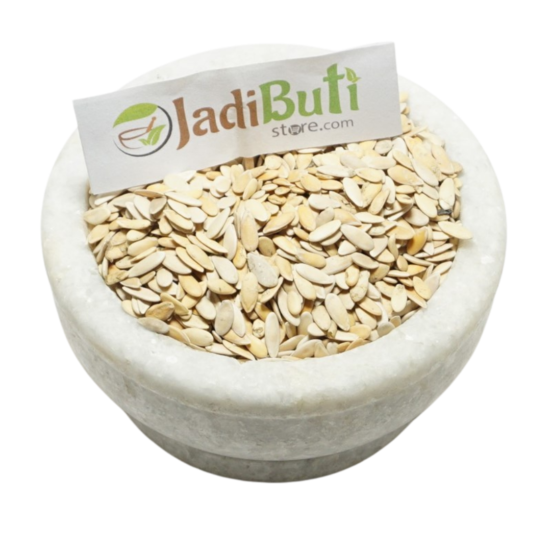 Kharbuja Beej pale flat muskmelon seeds with shell in a stone bowl — Jadibuti Store