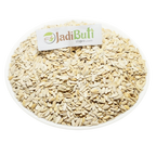 Kharbuja Beej pale flat muskmelon seeds with shell on a white plate — Jadibuti Store
