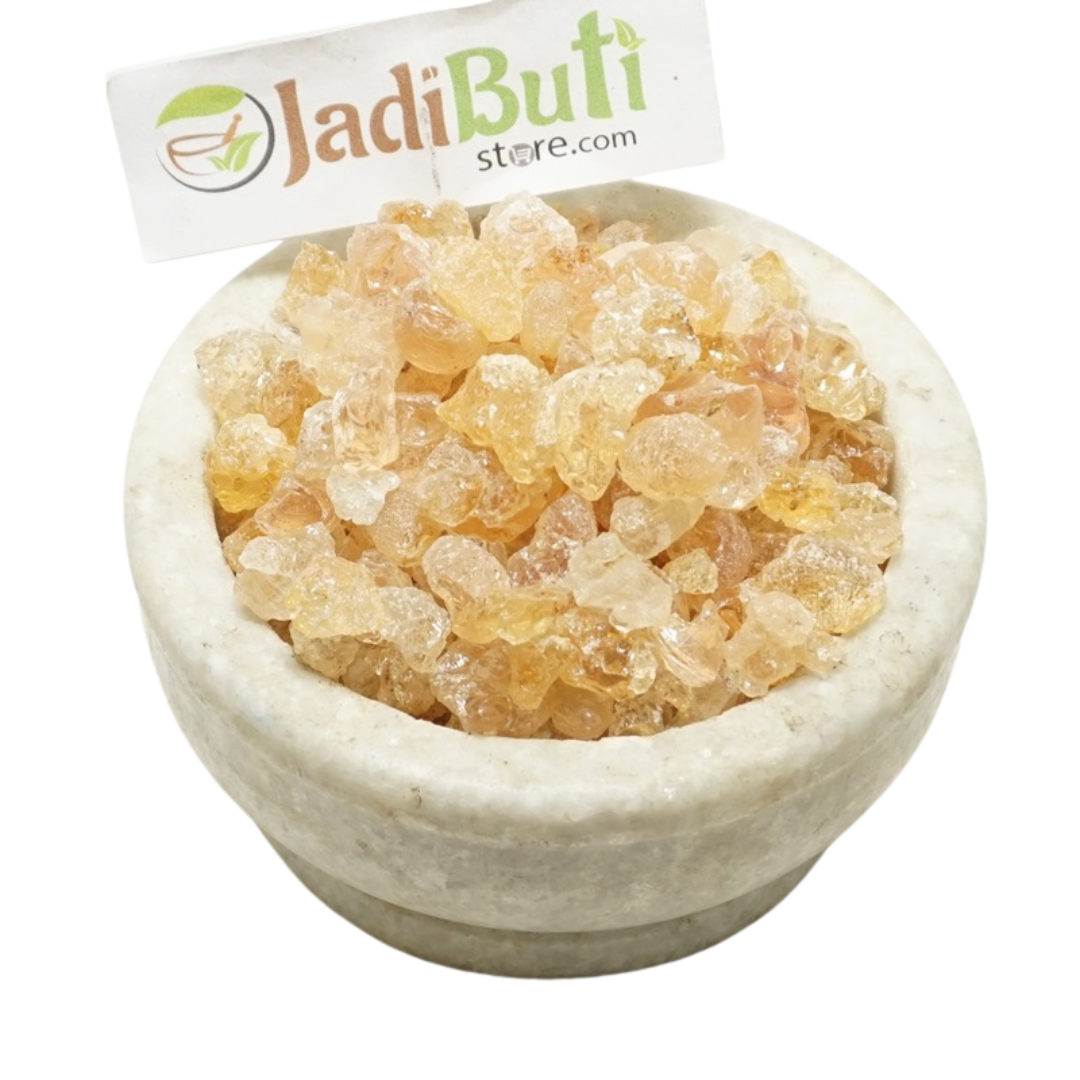 Kikar Gond pale amber gum pieces in a stone bowl — Jadibuti Store