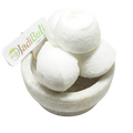 Kunja Mishri white rounded sugar-candy pieces with central indentations in a stone bowl — Jadibuti Store
