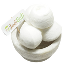 Kunja Mishri white rounded sugar-candy pieces with central indentations in a stone bowl — Jadibuti Store