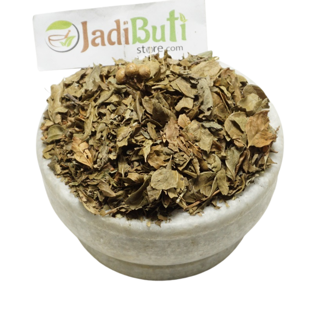 Dried Mehndi Patta henna leaves in a bowl with a Jadibuti Store card
