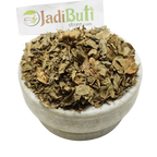 Dried Mehndi Patta henna leaves in a bowl with a Jadibuti Store card