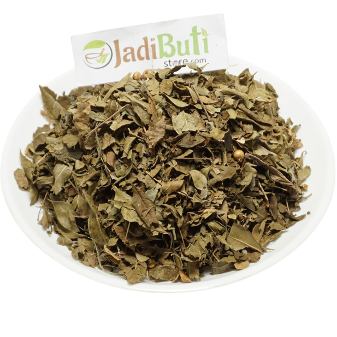 Dried Mehndi Patta henna leaves on a plate with a Jadibuti Store card