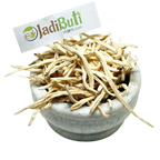 Natural dried Safed Musli root pieces in a stone bowl — Jadibuti Store