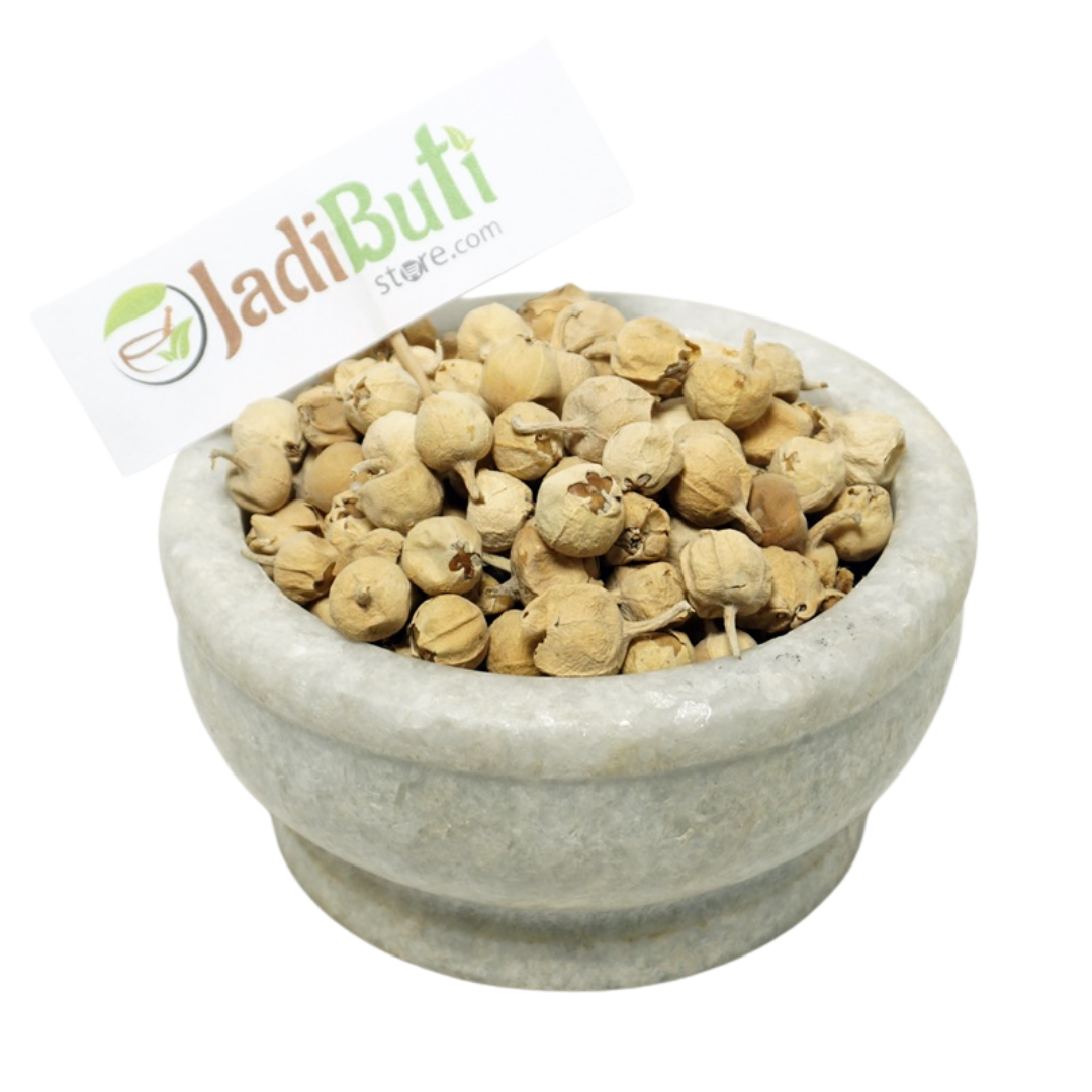 Paneer Doda pale tan rounded dried fruit pieces with papery material in a stone bowl — Jadibuti Store