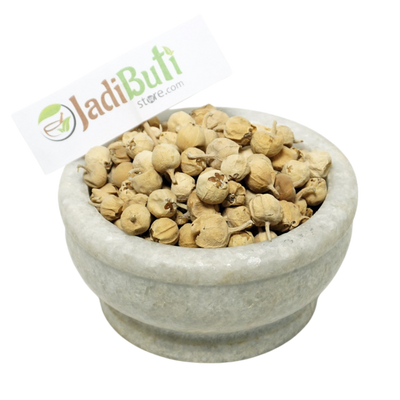 Paneer Doda pale tan rounded dried fruit pieces with papery material in a stone bowl — Jadibuti Store