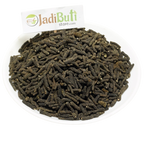 Pippali dried long-pepper fruiting spikes on a white plate — Jadibuti Store