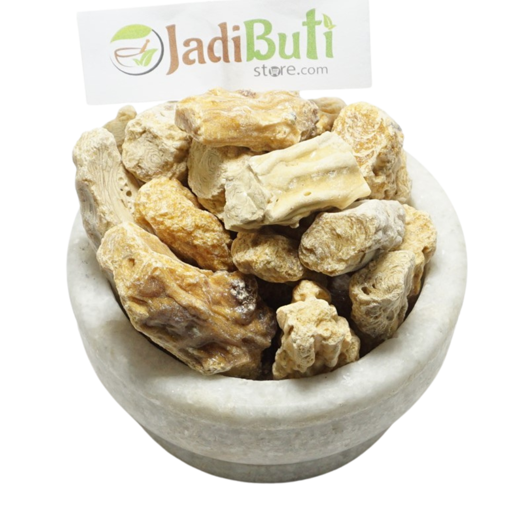 Raal beige irregular resin pieces in a stone bowl — Jadibuti Store