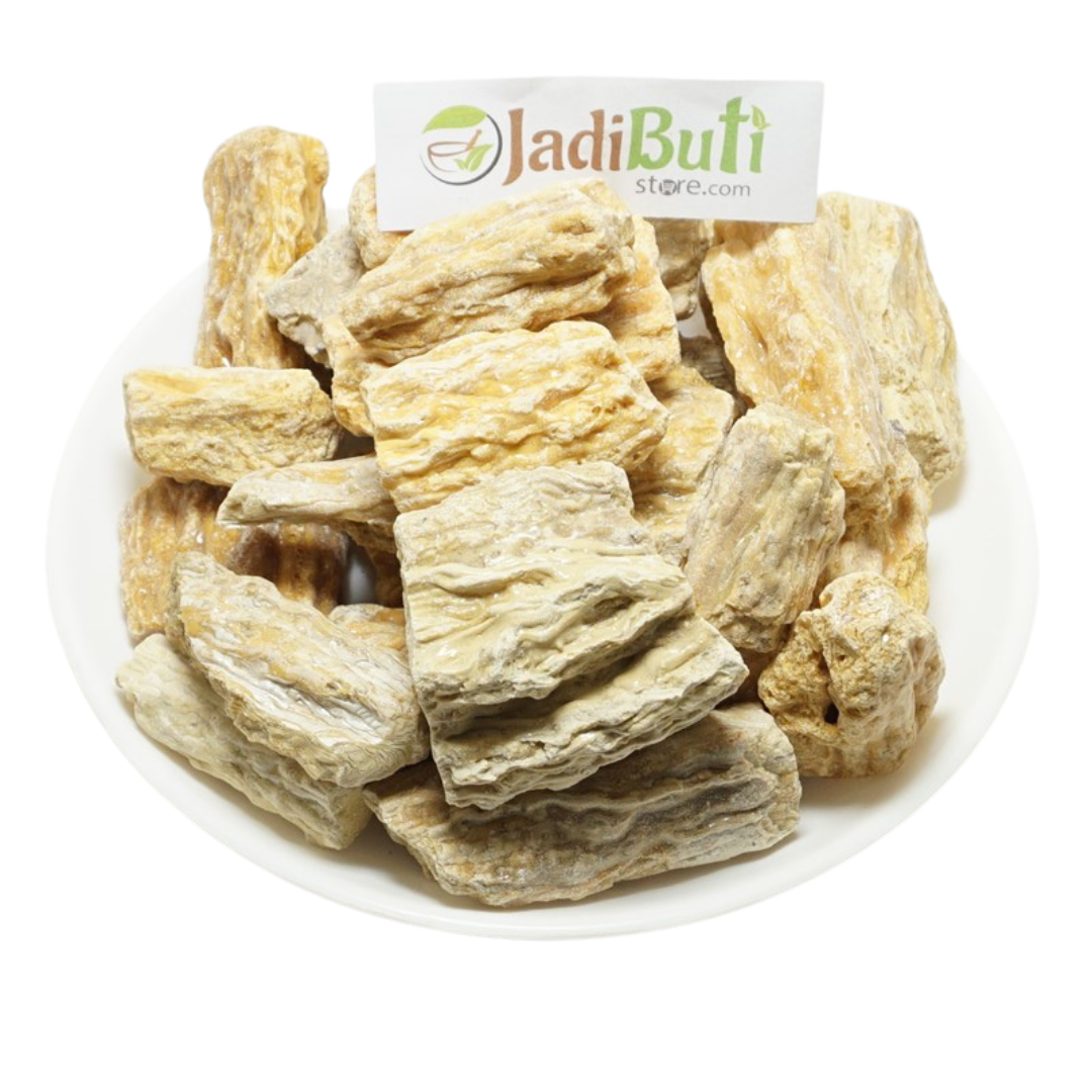 Raal beige resin pieces on a white plate — Jadibuti Store