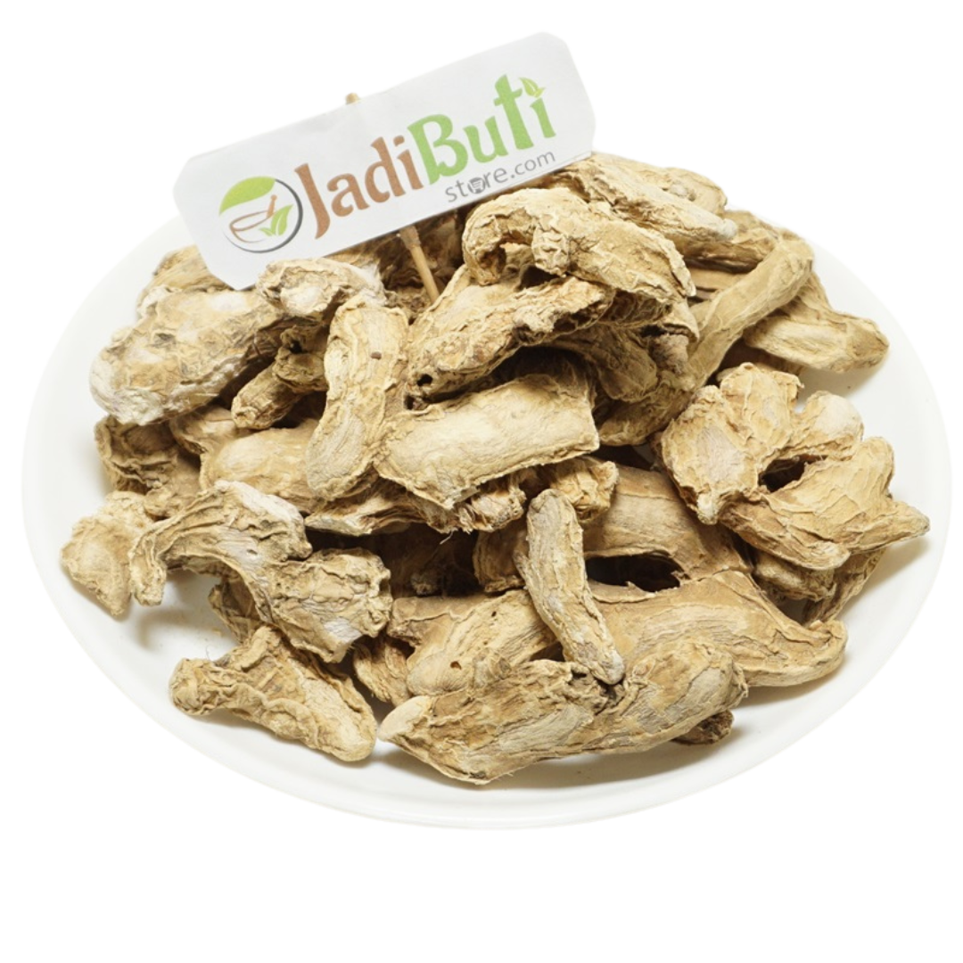 Sonth dried ginger rhizome pieces on a white plate — Jadibuti Store