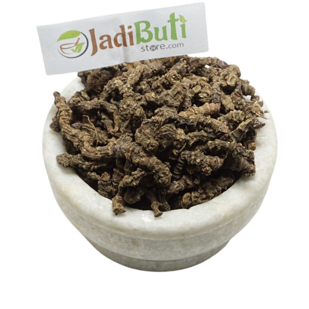 Tagar / Indian Valerian / तगर — dark brown rough underground pieces on a bowl