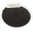 Mota Tukmaria Sabja dark seeds on a white plate — Jadibuti Store