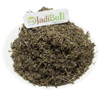 Tulsi Patta dried leaf and stem fragments on a white plate — Jadibuti Store