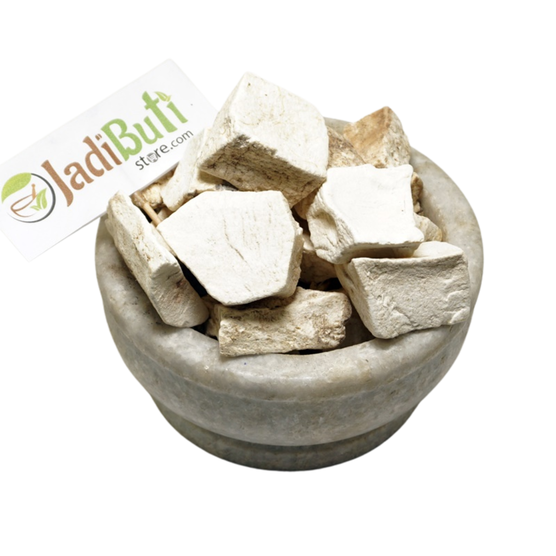 Vidari Kand dried root pieces in a stone bowl with Jadibuti Store card