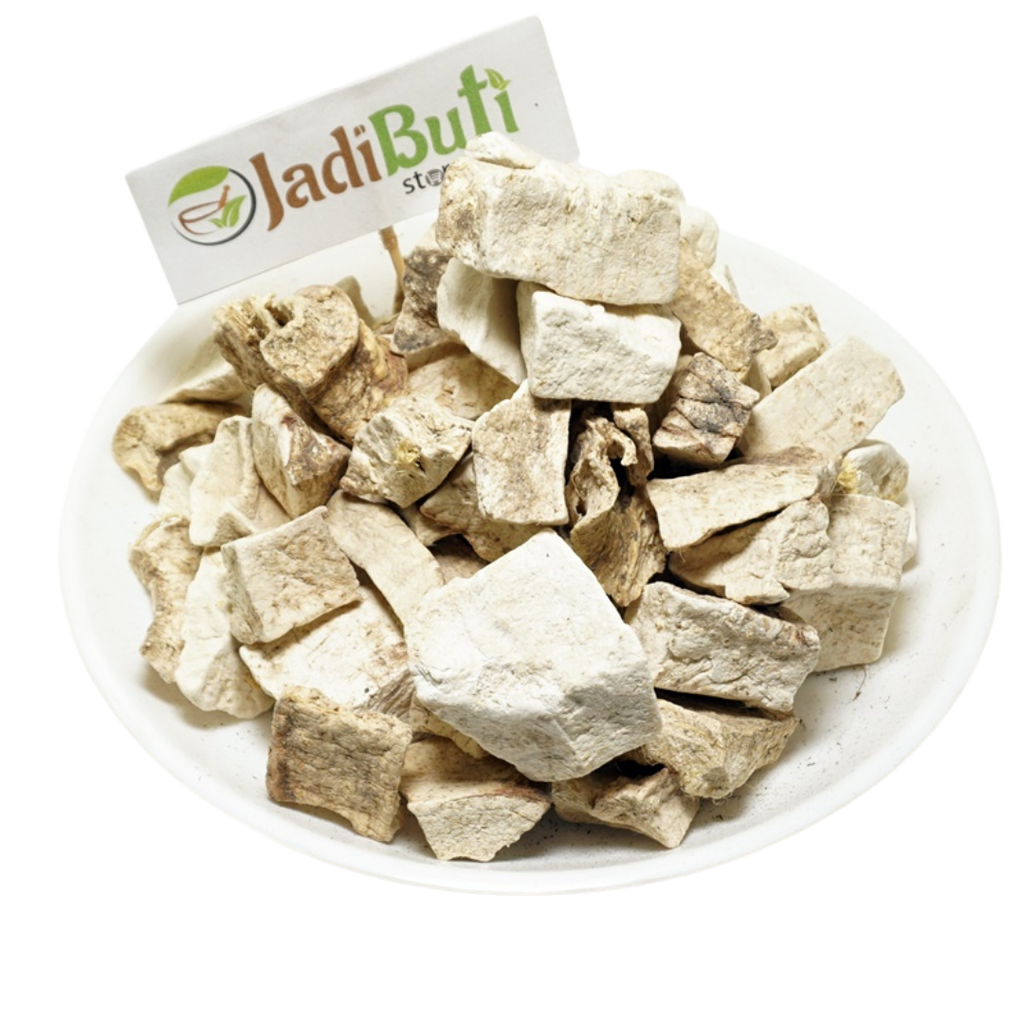 Vidari Kand dried root pieces on a white plate with Jadibuti Store card